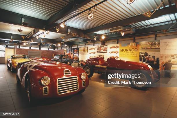 The 1947 Ferrari 125 S on display beside the1935 Alfa Romeo Monoposto 8C-35 Type C at the Ferrari Museum on 6 February 2002 at the Museo Ferrari,...