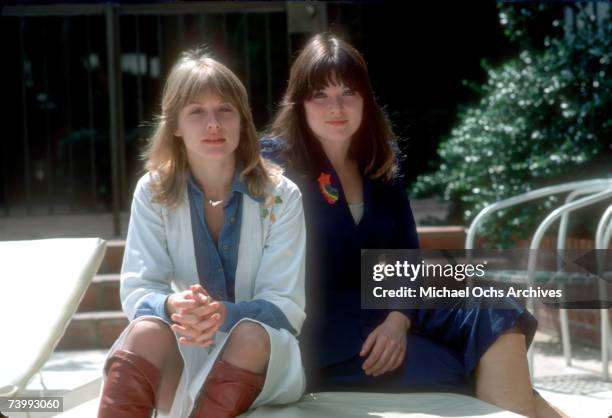 Sisters and musicians Ann Wilson and Nancy Wilson of the rock band "Heart" pose for a portrait session in September 1976 in Los Angeles, California.