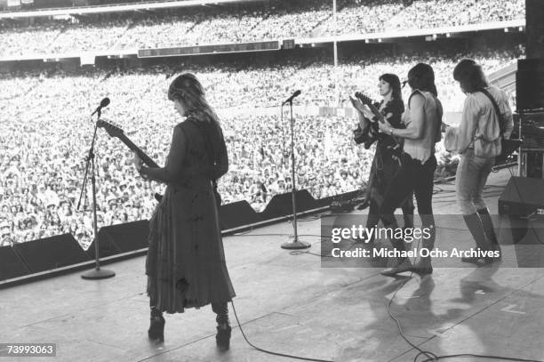 Nancy Wilson, Ann Wilson, Roger Fisher and Howard Leese of the rock band "Heart" performs onstage at the Oakland Coliseum on May 30, 1977 in Oakland,...