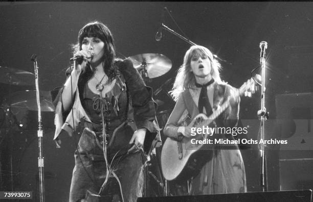 Ann Wilson and Nancy Wilson of the rock and roll band "Heart" perform onstage in circa 1977.