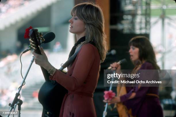 Nancy Wilson of the rock band "Heart" performs onstage at the Oakland Coliseum on May 30, 1977 in Oakland, California.