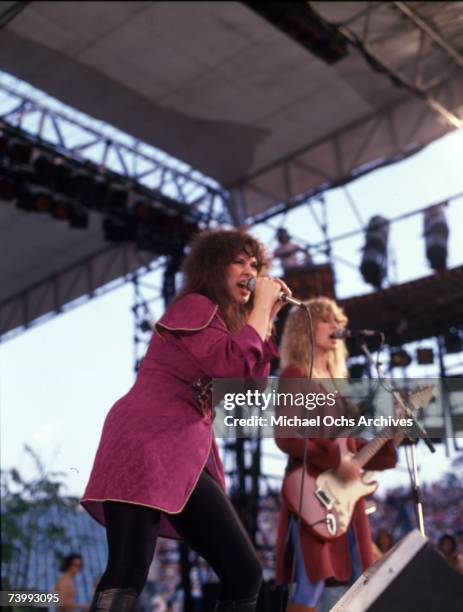 Ann Wilson and Nancy Wilson of the rock band "Heart" perform onstage in circa 1977.
