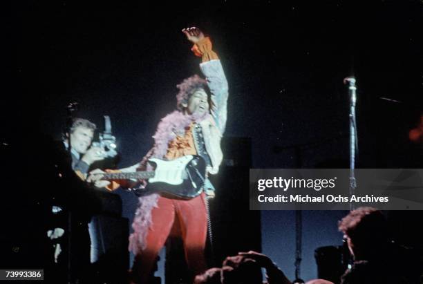 Jimi Hendrix performs onstage at the Monterey Pop Festival on June 18, 1967 in Monterey, California.