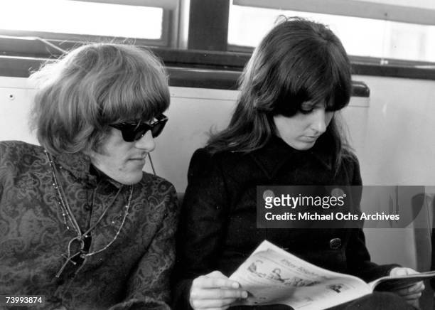 Guitarist Paul Kantner and Grace Slick of the rock group Jefferson Airplane backstage before a concert at Hunter College on October 20, 1967 in New...