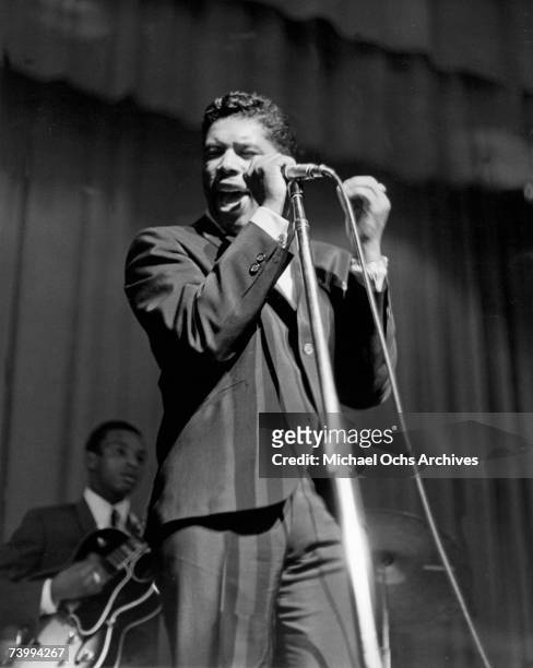 Singer Ben E. King performs at the Apollo Theatre in 1961 in New York, New York.