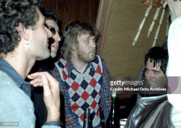 Drinking buddies known as 'The Hollywood Vampires' (L-R - John Lennon , Harry Nilsson and Alice Cooper celebrate an early Thanksgiving watching...