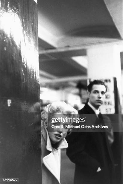 Actress Marilyn Monroe takes the subway in Grand Central Station on March 24, 1955 in New York City, New York.