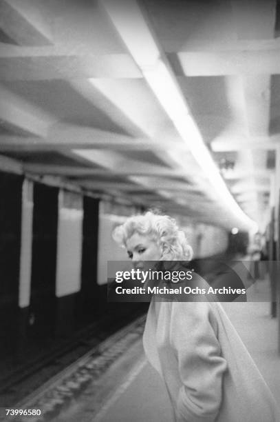 Actress Marilyn Monroe takes the subway in Grand Central Station on March 24, 1955 in New York City, New York.