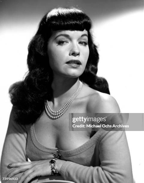 Pin-up model Bettie Page poses for a portrait in circa 1952.