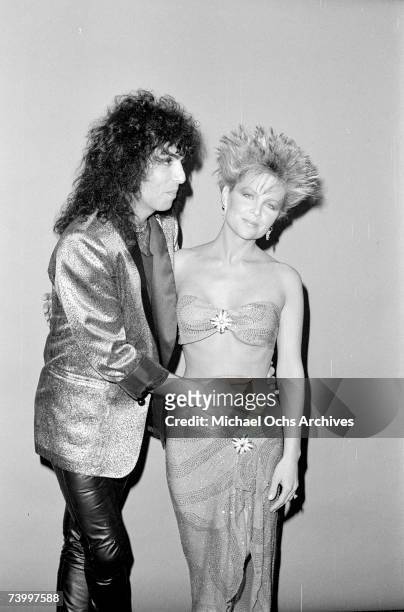 Guitarist Paul Stanley of the rock and roll band Kiss attends the Gold Awards with singer Lisa Hartman on August 15, 1982 in Los Angeles, California.