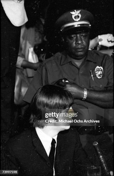 Drummer Ringo Starr of the rock and roll band "The Beatles" answers questions at a press conference at the Cinnamon Cinder youth nightclub on August...