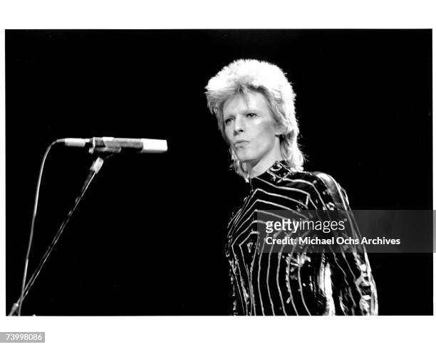 Musician David Bowie performs onstage on March 10, 1973 in Long Beach, California.