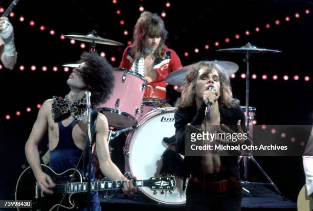Singer David Johansen, drummer Jerry Nolan and guitarist Sylvain Sylvain of the rock and roll group 'The New York Dolls' pose for a portrait with...