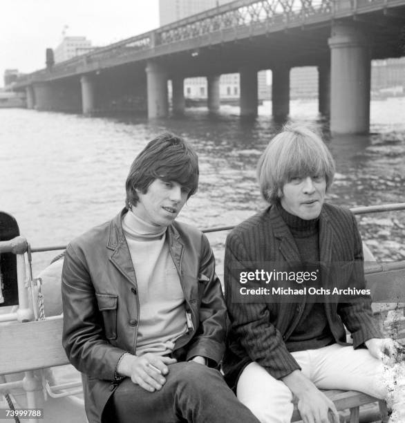 Guitarists Keith Richards and Brian Jones of the rock band 'the Rolling Stones' ride a ferry in October 1965 in New York City, New York.