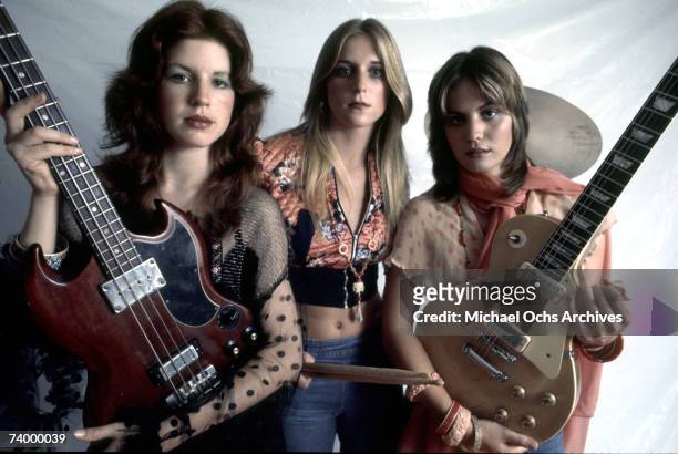 Original lineup of the rock band 'The Runaways' pose for a portrait in Los Angeles in September 1975. Micky Steele, Sandy West, Joan Jett.