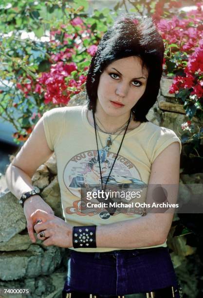 Guitarist Joan Jett of the rock band "The Runaways" poses for a portrait outside her family home in Canoga Park just outside Los Angeles, CA in...