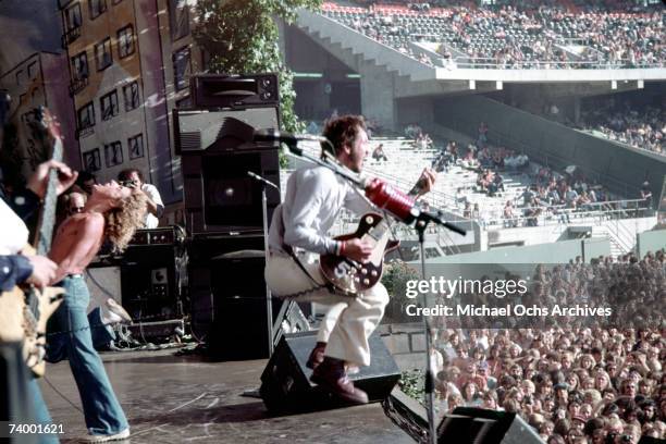 Singer Roger Daltrey, bassist John Entwistle and guitarist Pete Townshend of the rock and roll band "The Who" perform onstage at the Oakland Coliseum...