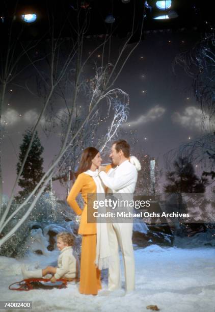 Singer Andy Williams and wife Claudine Longet perform on a Christmas show circa 1970.