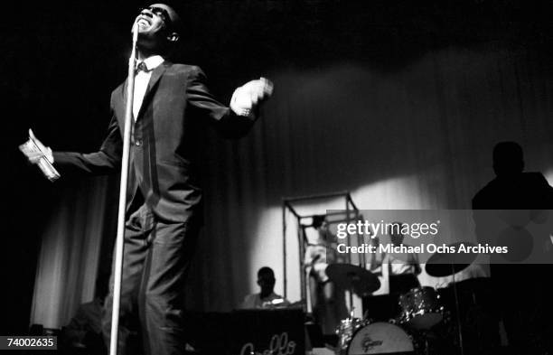 American singer and songwriter Stevie Wonder performs on the harmonica at the Apollo Theater in New York City, circa 1963.