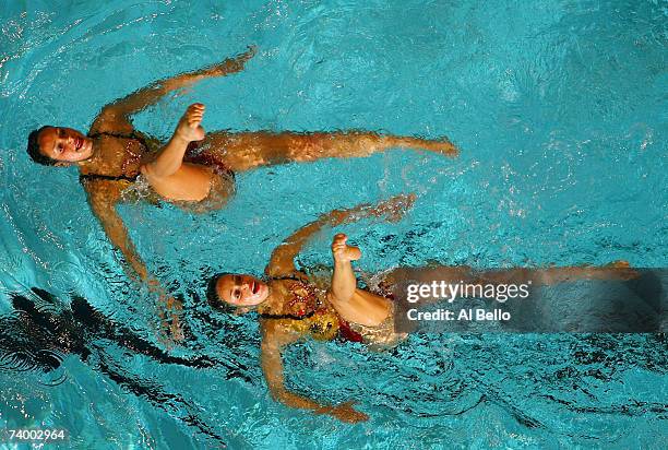 Anna and Mary Soto of the Walnut Creek Aquanutss, perform their duet routine in the preliminaries of the USA National Synchronized Swimming...