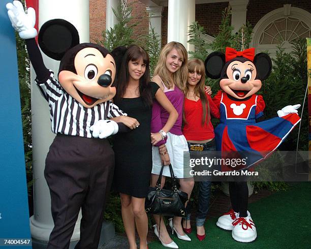 Isabella Soria of Germany, Andrea Guasch of Spain and Guilia Boverio of Italy pose with Disney characters Mickey and Minnie before the Disney Channel...