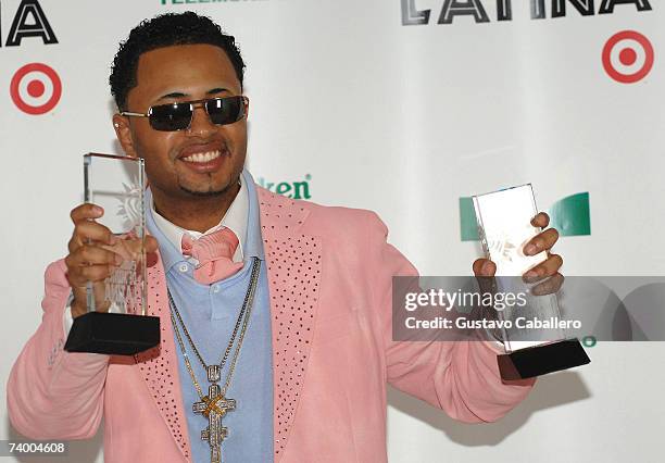 Toby Love poses with the "Latin Rap/Hip-Hop Album Of The Year" award in the press room at the 2007 Billboard Latin Music Awards at the Bank United...