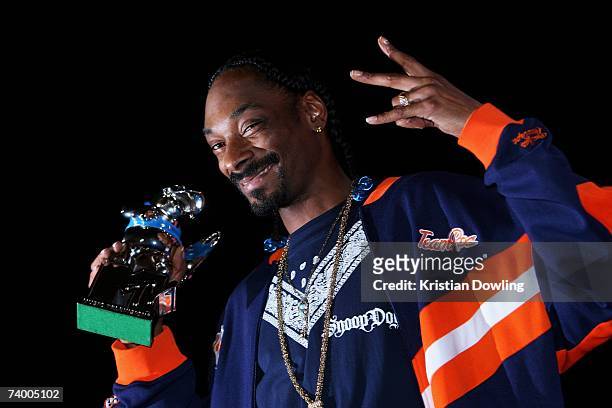 Rapper Snoop Dogg poses with his award for Best Hip Hop Video for Drop It's Like It's Hot in the media room during the second MTV Australia Video...