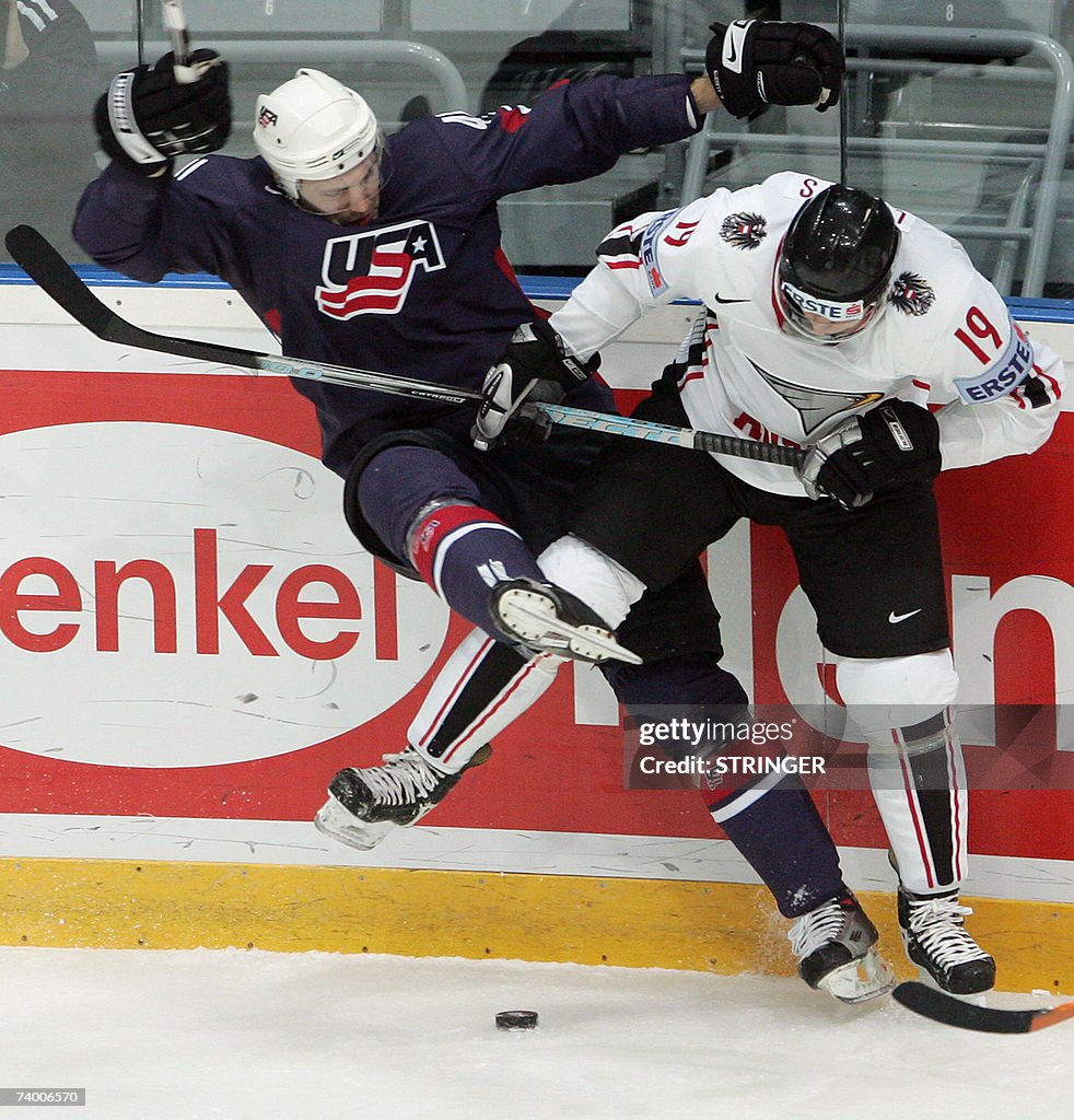 US Andrew Alberts (L) fights for the puc...