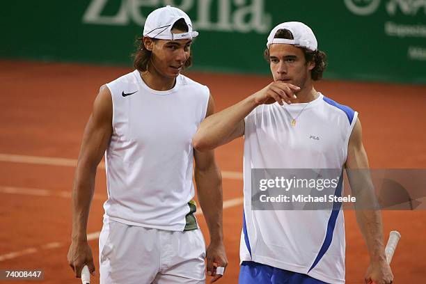 Bartolome Salva-Vidal of Spain and Rafael Nadal of Spain during their doubles victory in the Quarter Final match against Mark Knowles of Bahamas and...