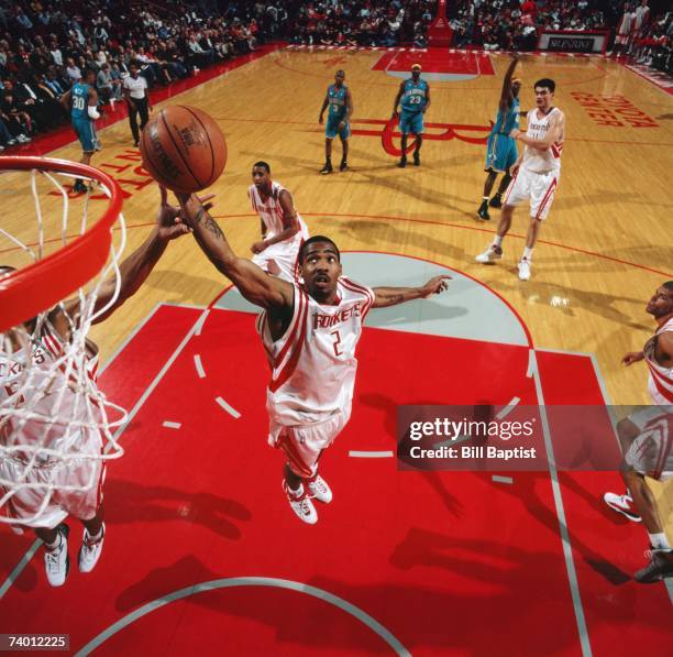 Luther Head of the Houston Rockets grabs a rebound during a game against the New Orleans/Oklahoma City Hornets at Toyota Center on April 14, 2007 in...