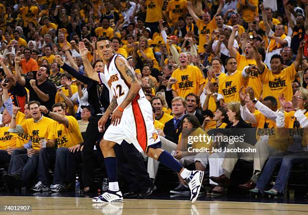 Matt Barnes of the Golden State Warriors celebrates after hitting a shot against the Dallas Mavericks in Game Three of the Western Conference...