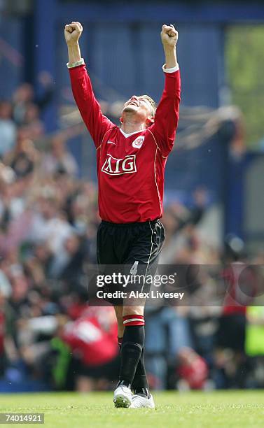 Gabriel Heinze of Manchester United celebrates after his team mate Wayne Rooney scored his team's third goal during the Barclays Premiership match...