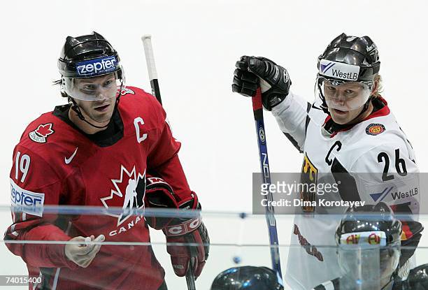 Germany's Daniel Kreutzer and Shane Doan looks on during the IIHF World Ice Hockey Championship preliminary round, group C match between Germany and...
