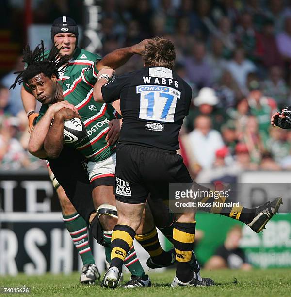Seru Rabeni of Tigers is tackled by Nick Adams of Wasps during the Guinness Premiership match between Leicester Tigers and London Wasps at Welford...