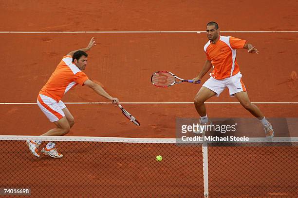 Jonathan Erlich and Andy Ram of Israel play during their Semi Final match against Rafael Nadal and Bartolome Salva-Vidal of Spain on Day Six of the...