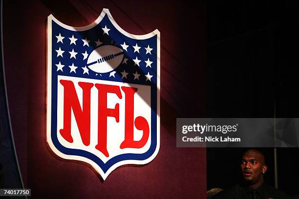 JaMarcus Russell waits off stage to be introduced to the crowd before announcing being chosen first overall by the Oakland Raiders at the 2007 NFL...