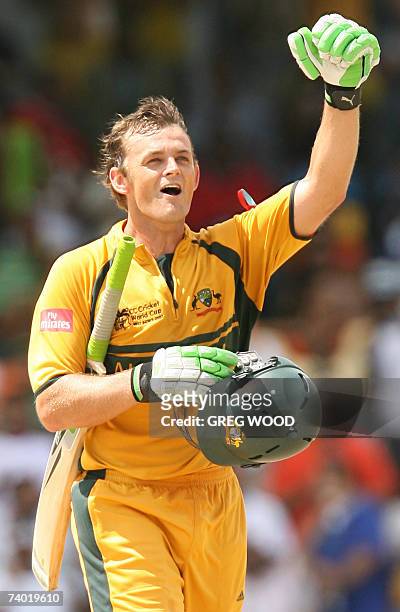 Australian cricketer Adam Gilchrist celebrates his century against Sri Lanka in the final of the ICC Cricket World Cup 2007, at the Kensington Oval...