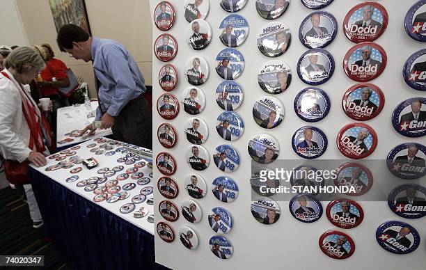 Columbia, UNITED STATES: Buttons are on display supporting the Democratic presidential candidates, 28 April 2007, at the South Carolina Democratic...