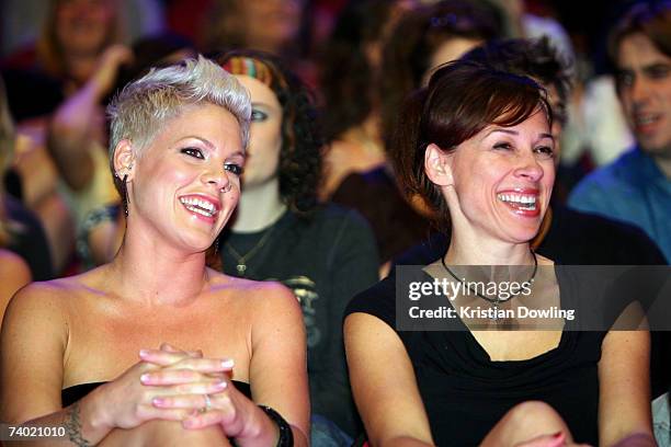 Singer Pink and guest watch the show from the audience at the third annual MTV Australia Video Music Awards 2007 at Acer Arena on April 29, 2007 in...
