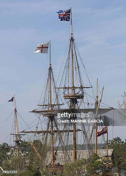 Jamestown, UNITED STATES: TO GO WITH AFP STORY: JAMESTOWN--The birth of a nation 400 years ago: Flags blowing in the breeze atop the masts of the...