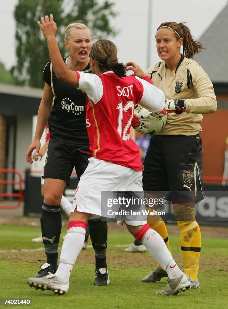 Johanna Frisk of Umea IK and Alex Scott of Arsenal look to disagree during the Womens UEFA Cup Final 2nd Leg match between Arsenal and Umea IK at...