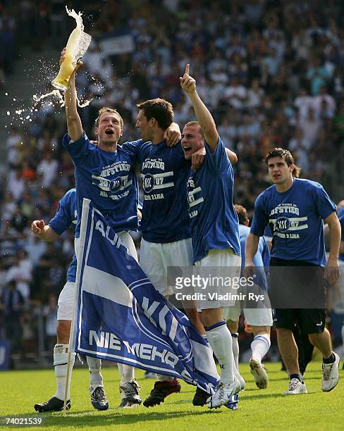 Players of Karlsruhe celebrate after winning 1:0 the Second Bundesliga match between Karlsruher SC and Spvgg Unterhaching at the Wildpark stadium on...