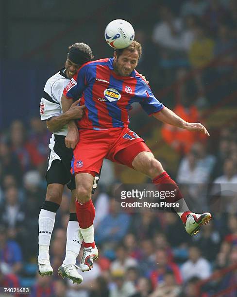 Shefki Kuqi of Crystal Palace competes for the ball against Dean Leacock of Derby during the Coca Cola Championship match between Crystal Palace and...