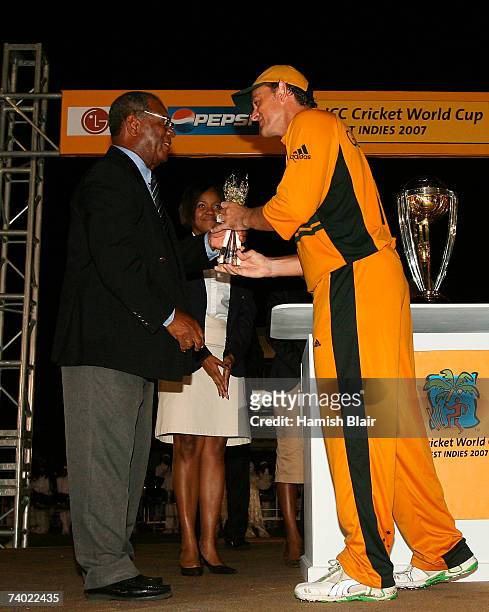 Sir Everton Weekes presents Adam Gilchrist of Australia with the Player of the Match after the ICC Cricket World Cup Final between Australia and Sri...