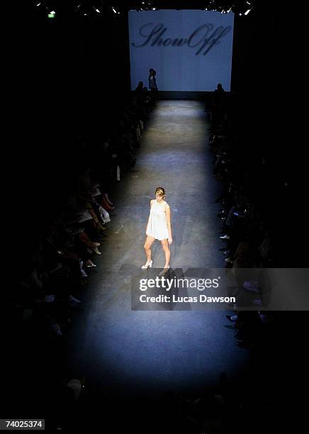 Model showcases an outfit on the catwalk by designer Show Off as part of the Women's Ready To Wear number 1 Catwalk show on day one of Rosemount...