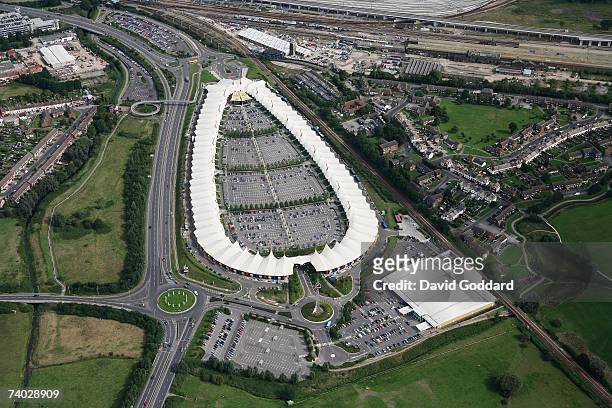 Next to the M20 is the Richard Rogers cutting edge Designer Outlet shopping Centre at Ashford in this aerial photo taken on 30th June, 2006.