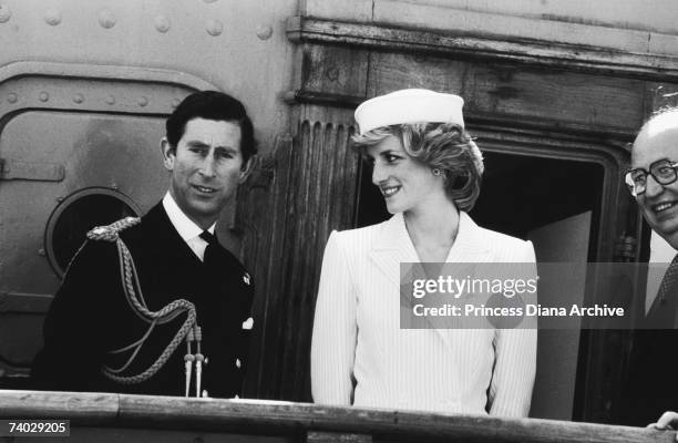 Princess Diana and Prince Charles at an Italian naval base at La Spezia, 20th April 1985. Charles is wearing a naval Commander's uniform, while Diana...