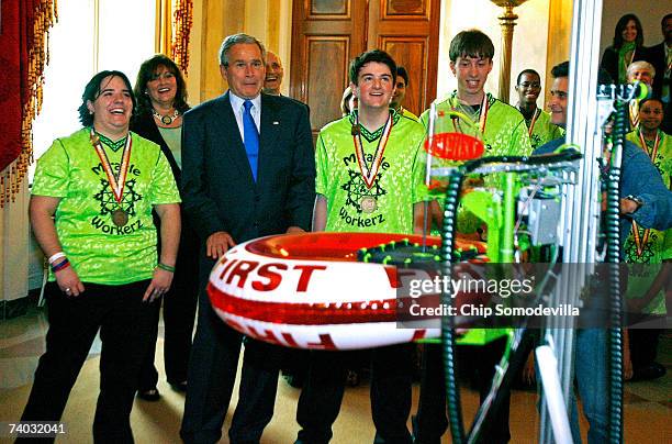 Us President George W. Bush watches a demonstration by the FIRST Robotics Competition "Chairman's Award" winning team, the Miracles of Engineering...