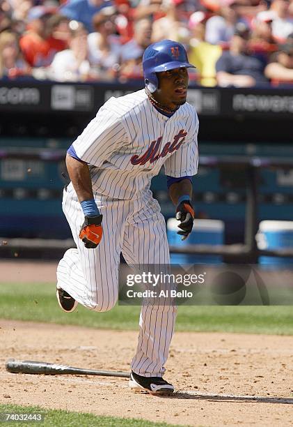 Jose Reyes of the New York Mets hits a three run triple against the Atlanta Braves during their game at Shea Stadium April 22, 2007 in the Flushing...