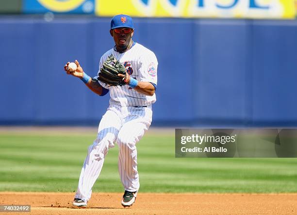 Jose Reyes of the New York Mets fields the ball against the Atlanta Braves during the game at Shea Stadium on April 22, 2007 in the Flushing...